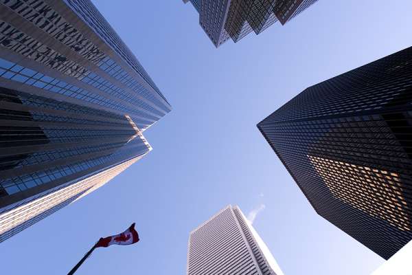 skyscrapers with flag of canada