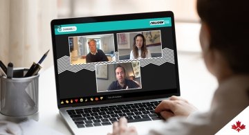 person watching video conference on laptop computer
